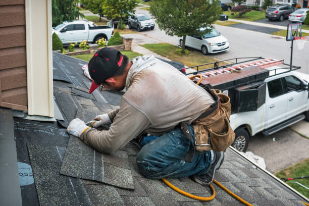 Professional Roofing technician working in White Marsh, VA